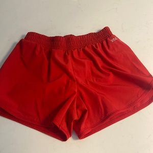 dicks sporting goods, red shorts.
